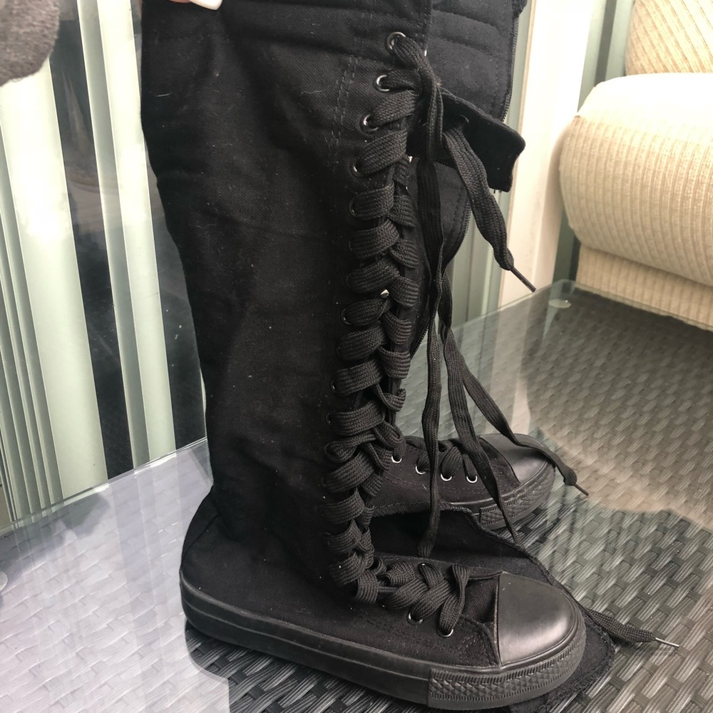 Black knee high shoes